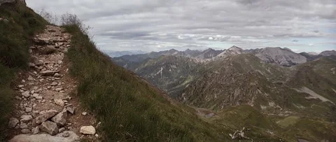 Anamorphic View of the Alps Mountains on a Cloudy Summer Day. Stock Footage 339630983