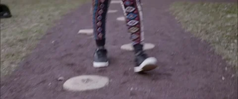 Anamorphic Walking Stone Path Medium Front Low Angle Shot Stock Footage 201266795
