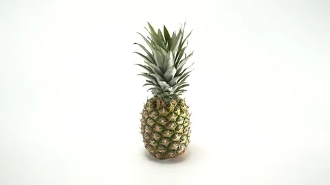 Ananas on white background, turning 스톡 동영상 75729572
