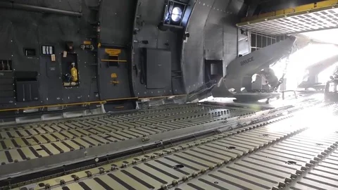 Anchor being loaded onto C-17 Globemaster in support of missing submarine Stock Footage 82527070