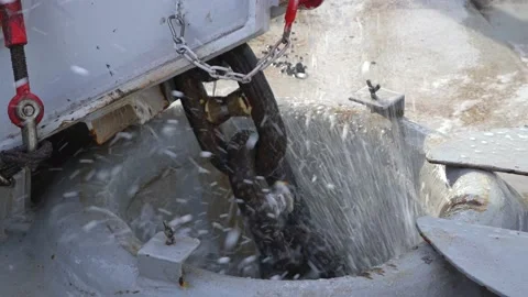 Anchor chain lifting. Splashes of water. High tension Stock Footage 194416134