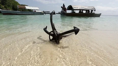 Anchor of dhow boat on sandy beach Video stock 84583551