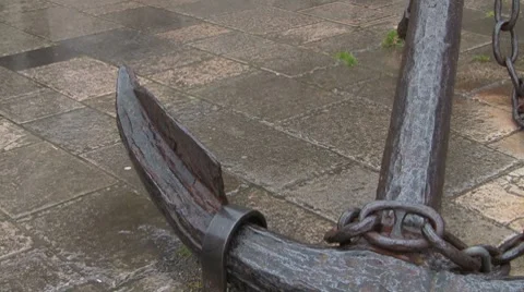 Anchor down those wet thoughts - ships anchor in the rain Stock Footage 7157868