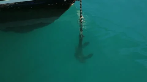 Anchor dropping into sea Stock Footage 12735703