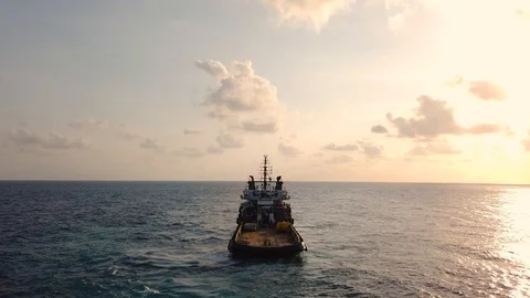 Anchor handling vessel pulling an anchor and wire Stock Footage 102639005