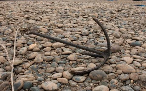 Anchor land on the river Stock Photos
