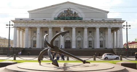 Anchor lies on the background of the building of the Spit of Vasilyevsky Island Stock Footage 101660662