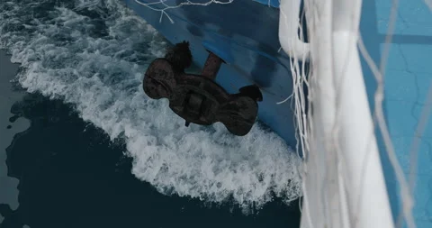 Anchor raised to the top. The ship in motion, cuts the waves Stock Footage 165587699