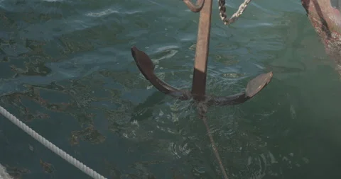 An anchor of a sailing ship is pulled up  Stock Footage 142805973