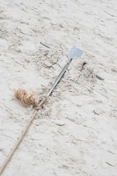 Anchor on the sand Stock Photos