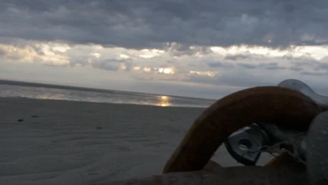 Anchor on Sandbar at Sunset Stock Footage