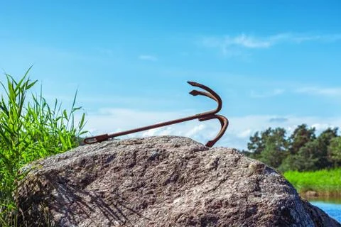 Anchor on the stone. Stock Photos