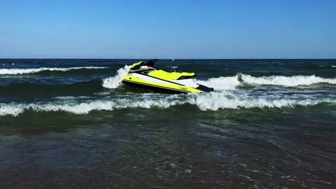 Anchored Jet Ski swayed by the waves Stock Footage 137600714