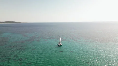 Anchored Sailboat Forward Left-to-Right Aerial, Kassandra, Greece Stock Footage 329294023