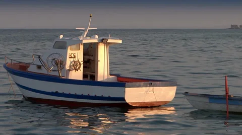 Anchored small boat Видео 34470735