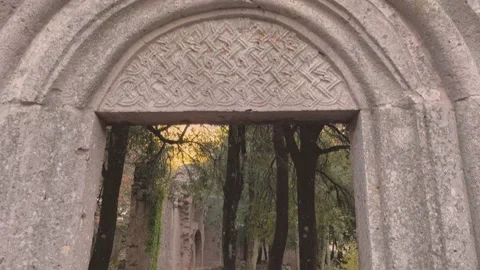 Ancient Abbey Archway pan down Stock Footage 222582833