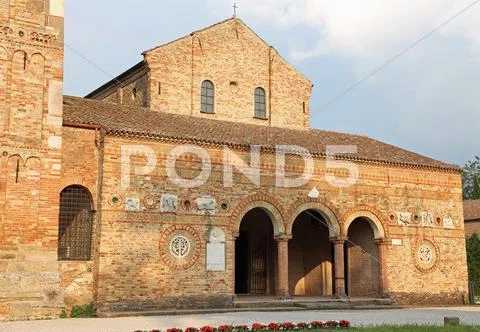 Ancient Abbey of Pomposa historic building in the Po Valley near Ferrara in I Stock Photos