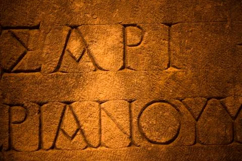 Ancient Alphabets on Marble Background Texture Stock Photos