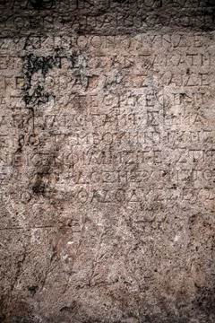 Ancient Alphabets on Marble Background Texture Stock Photos