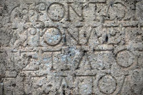 Ancient Alphabets on Marble Background Texture Stock Photos