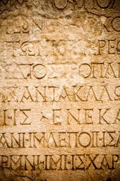 Ancient Alphabets on Marble Background Texture Stock Photos