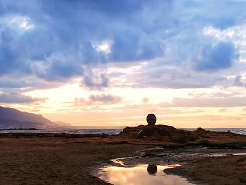 Ancient amphora at sunset Stock Photos