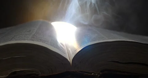 Ancient ancient book thick with knowledge with smoke swirling around it bright Stock Footage 205492650