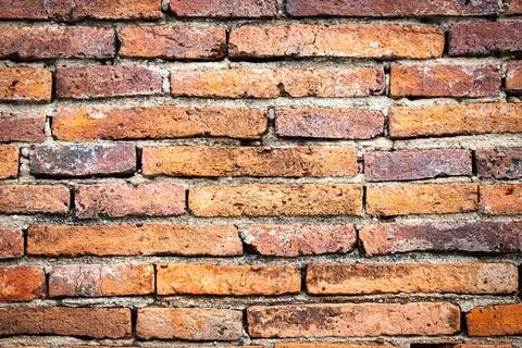 Ancient and old red brick block background and texture. Stock Photos