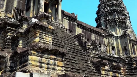 Ancient Angkor Wat Temple Tower Against Blue Sky, Historic Khmer Architecture Stock Footage 339324228