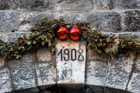 Ancient arch closeup with "1908" sign Stock Photos