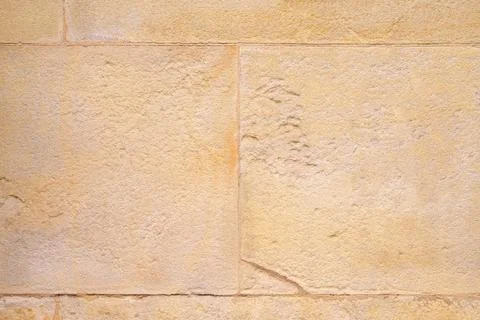 Ancient architectural wall with rectangular stone blocks.  Stock Photos