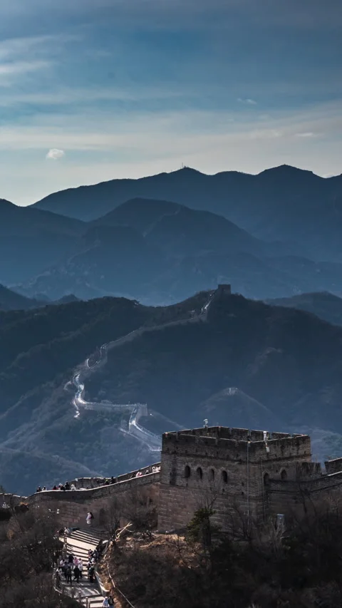 The ancient architecture of the Great Wall of China, stretching for thousands of Stock Footage 298323448