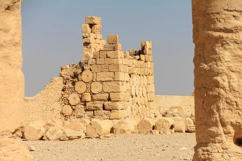 Ancient Architecture with Stone Columns and Historical Buildings in a Deser.. Stock Photos