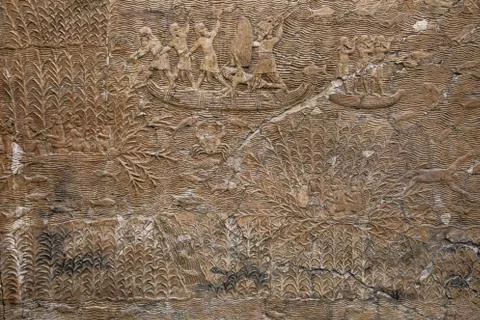 Ancient Assyrian stone carving with scripting, BRITISH MUSEUM, London, UK. Ca Stock Photos