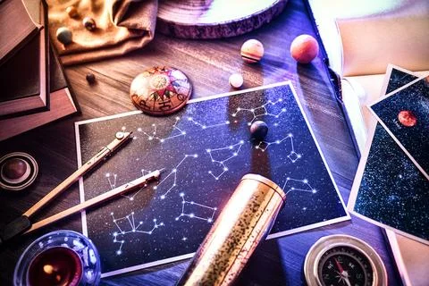 Ancient astrology study with retro objects on wooden table detail Stock Photos