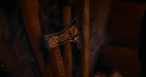 Ancient axe with symbols of Slavic, Celtic or Scandinavian culture, closeup view Stock Footage 252115394