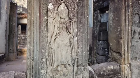 Ancient bas-reliefs in Bayon Temple, Angkor complex, Siem reap, Cambodia Stock Footage 106249772