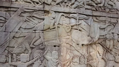 Ancient bas-reliefs in Bayon Temple, Angkor complex, Siem reap, Cambodia Stock Footage 106250982
