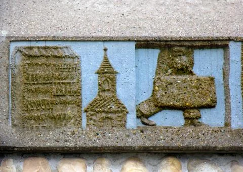 Ancient bas-reliefs on the Windows and walls of historical buildings Ancie... Stock Photos