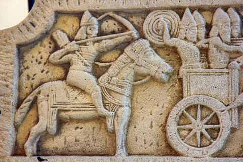 Ancient bas-reliefs on the Windows and walls of historical buildings Ancie... Stock Photos