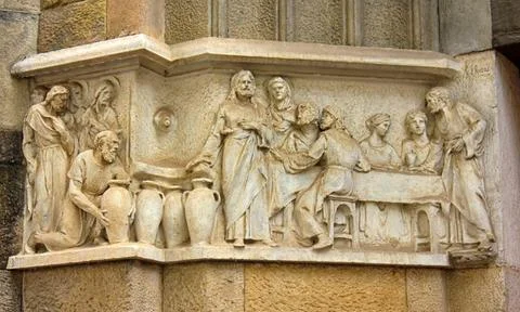 Ancient bas-reliefs on the Windows and walls of historical buildings Ancie... Stock Photos