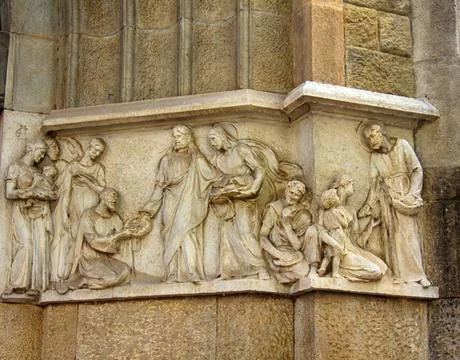 Ancient bas-reliefs on the Windows and walls of historical buildings Ancie... Stock Photos