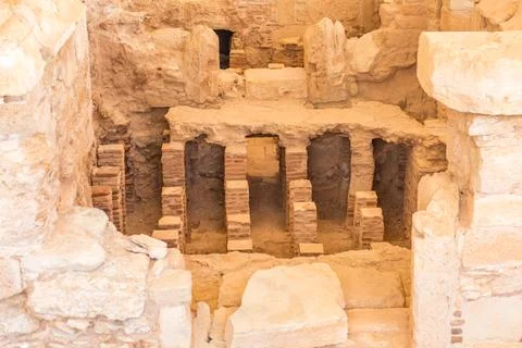 Ancient bath complex ruins at the Apollo Hylates Sanctuary in Cyprus, featuri Stock Photos