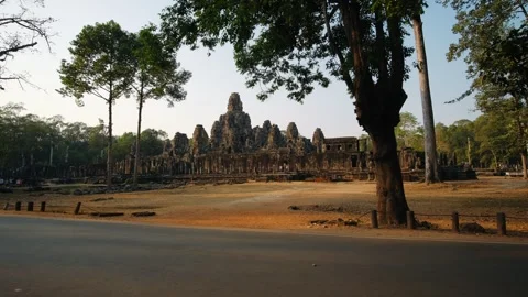 Ancient bayon temple in angkor thom, cambodia. The majestic stone ruins and Stock Footage 326110672