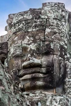Ancient Bayon temple complex in the center of Angkor Thom in Cambodia. Stock Photos