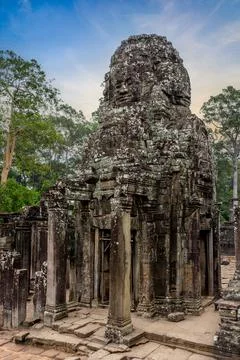 Ancient Bayon temple complex in the center of Angkor Thom in Cambodia. Stock Photos