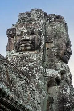 Ancient Bayon temple complex in the center of Angkor Thom in Cambodia. Stock Photos