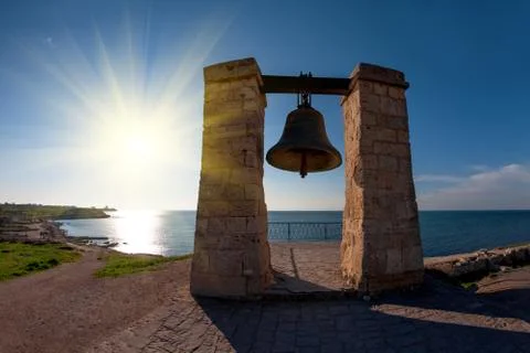 Ancient bell on the coast Stock Photos