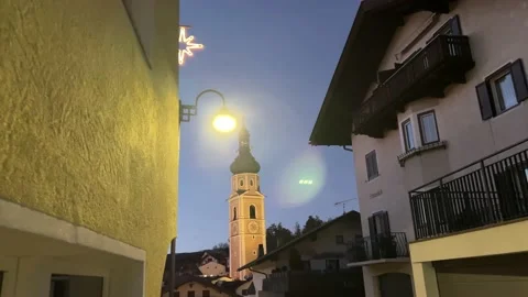 Ancient bell tower in the evening city Video stock 232221866