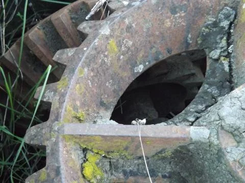 Ancient bevel drive engineered cogs to drive a water well mechanism Stock Photos